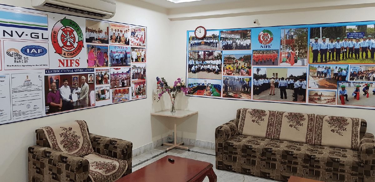 NIFS India office reception area with a wall of photographs from student activities