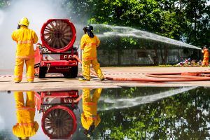 Fire fighters using modern fire fighting technology.