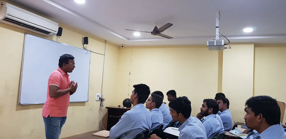 Guest faculty member teaching NIFS safety students in a classroom