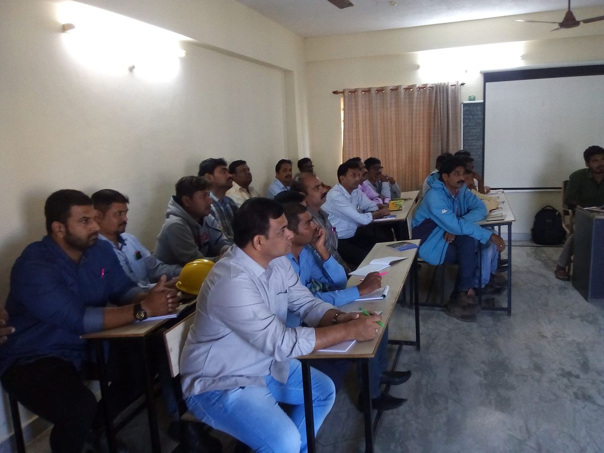 Working professionals attending a classroom safety training session at a NIFS centre